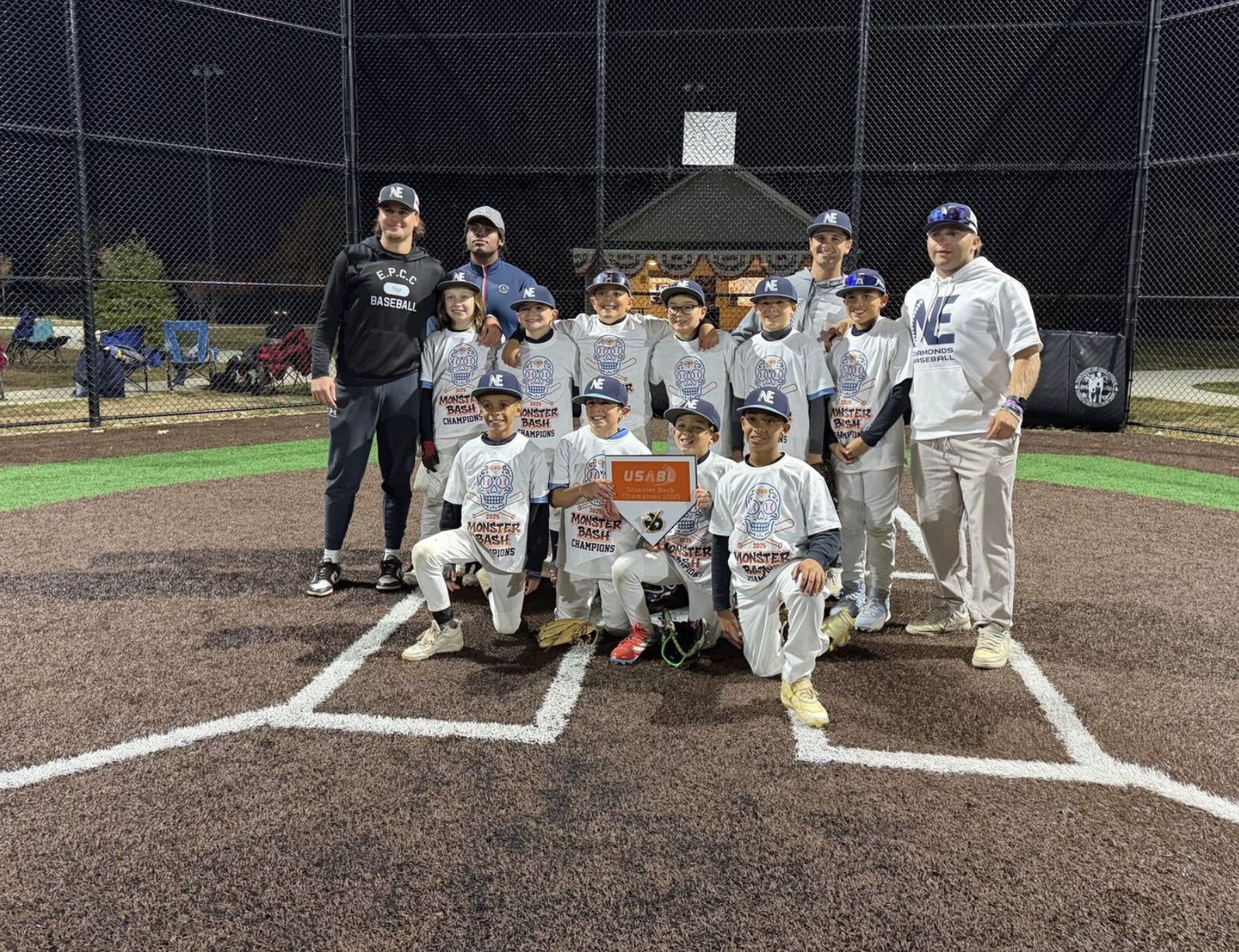Night game, trophy in hand